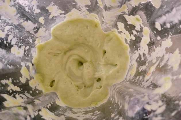 Place the avocado flesh into the blender with the ice, coconut milk, and honey, and blend well (start slow and increase the speed slowly).