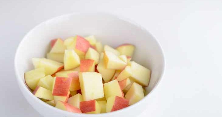 Once the sweet potato cubes are cooked, add to the baking dish: the diced apples