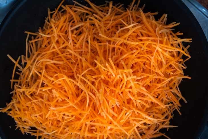 Cook the shredded carrots - Paleo Carrot Mango Mussels Hash Recipe [Paleo, AIP] #paleo #autoimmune #aip #recipe https://paleoflourish.com/carrot-mango-mussels-hash-recipe-paleo-aip