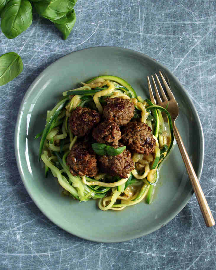 Paleo Crockpot Zucchini Spaghetti Meatballs Recipe #paleo https://paleoflourish.com/paleo-crockpot-spaghetti-meatballs-recipe