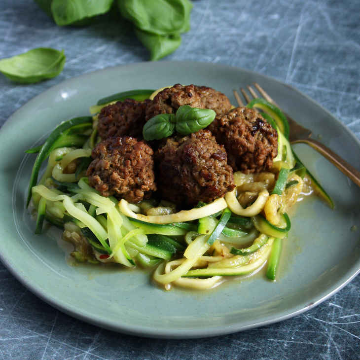 Paleo Crockpot Zucchini Spaghetti Meatballs Recipe #paleo https://paleoflourish.com/paleo-crockpot-spaghetti-meatballs-recipe