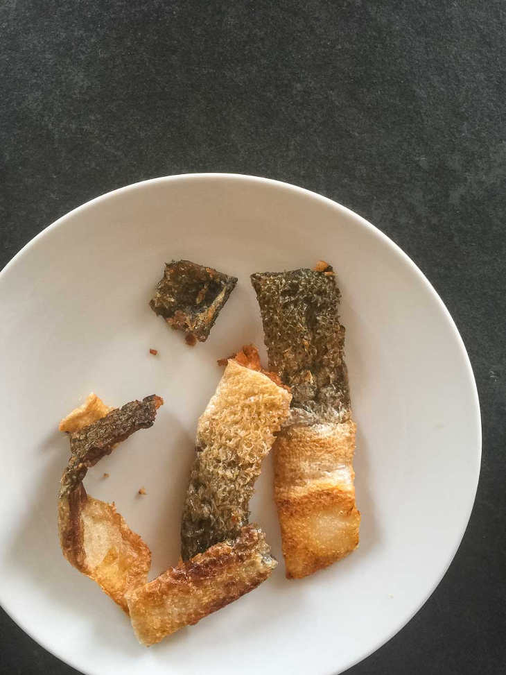 Paleo Crispy Salmon Skin Recipe #paleo https://paleoflourish.com/paleo-crispy-salmon-skin-recipe