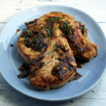 Paleo Crockpot Pork Chops and Gravy Recipe #paleo https://paleoflourish.com/paleo-crockpot-pork-chops-gravy-recipe