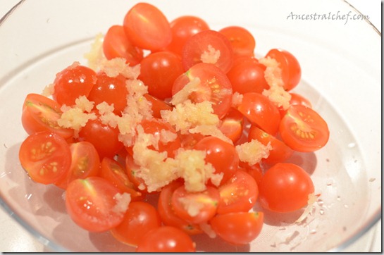 minced garlic on tomatoes